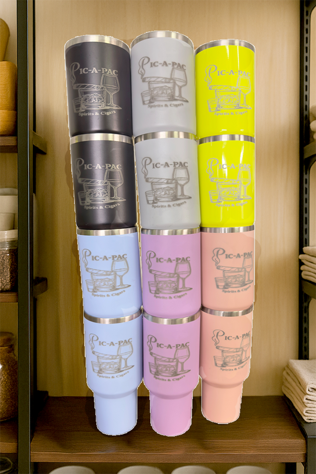 Stack of Pic-A-Pac umbrellas in various colors on a wooden shelf.