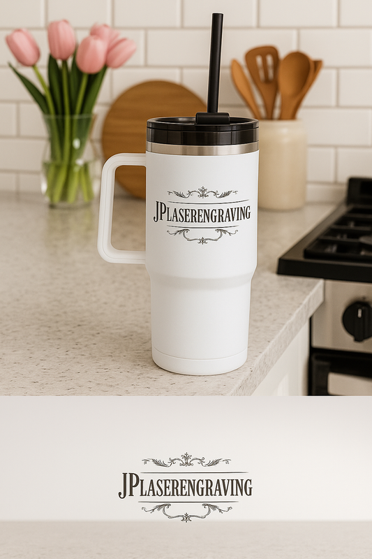 White travel mug with black lid and straw on a kitchen counter, featuring 'JPlaserengraving' branding.
