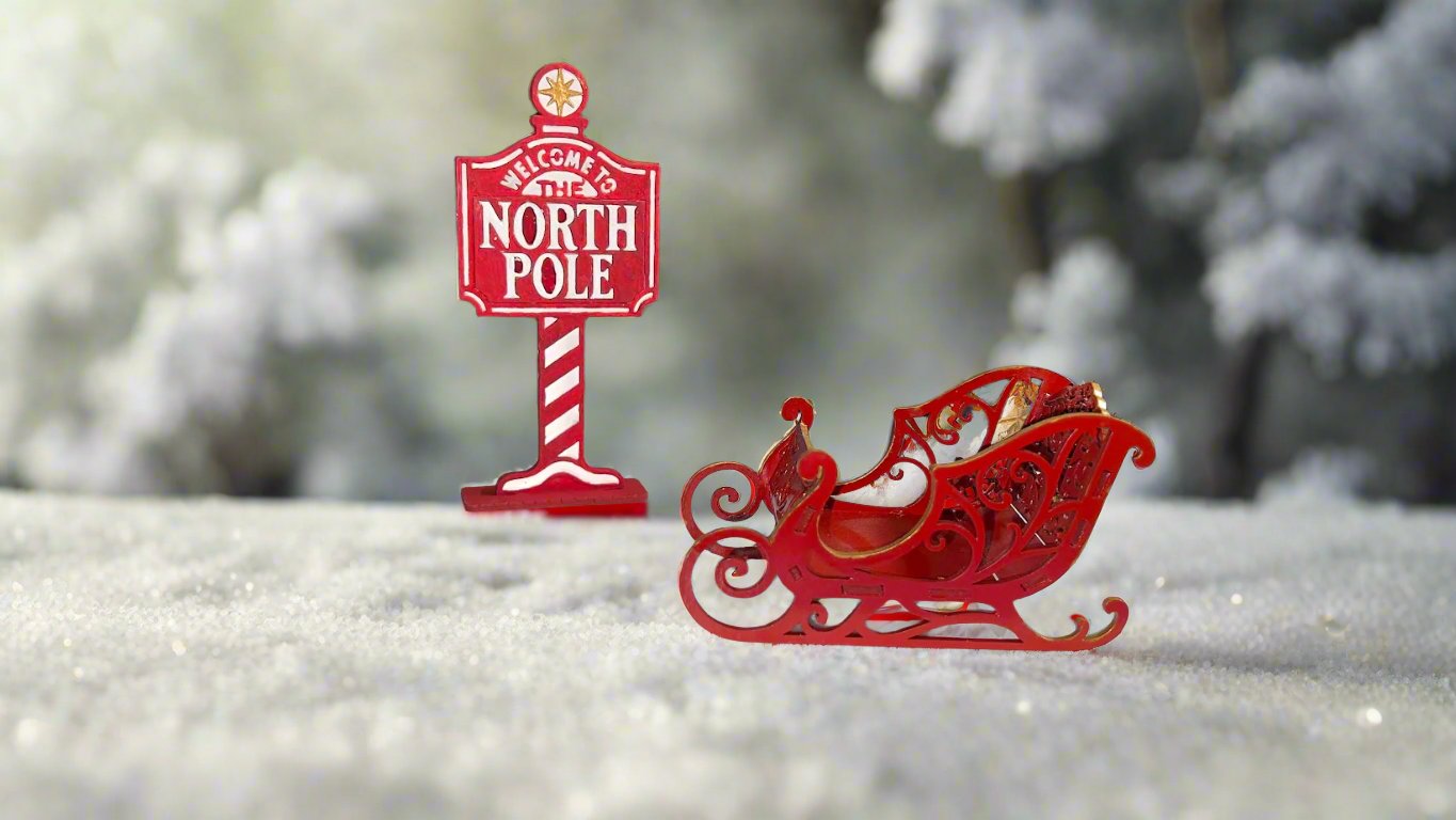 Santa's Sleigh and Welcome to the North Pole sign post